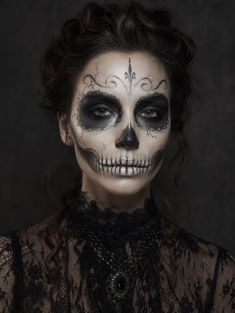 Elegant skeleton makeup Halloween beauty portrait with black lace